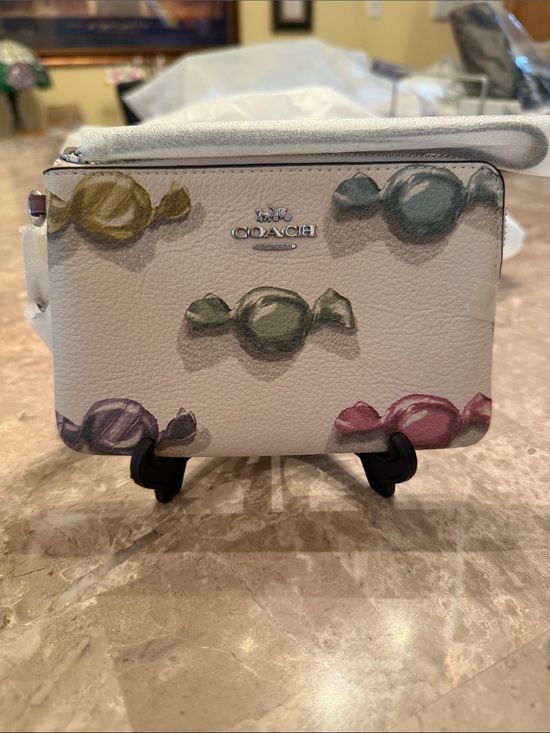 Coach Handbags - COACH White Leather Candy Print Wristlet NWT